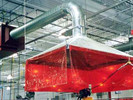 Micro Air MC3000 ducted to hood over weld cell eliminates smoke in work area.
