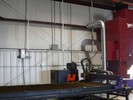 Side mounted spark arrestor on RP8 dust collector reduces risk of fire from hot sparks generated in the cutting operation