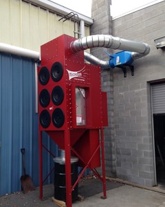 Micro Air RPO6, installed outdoors and ducted to multiple grinding stations inside the facility, is equipped with backblast damper and explosion vent for NFPA - OSHA complianc